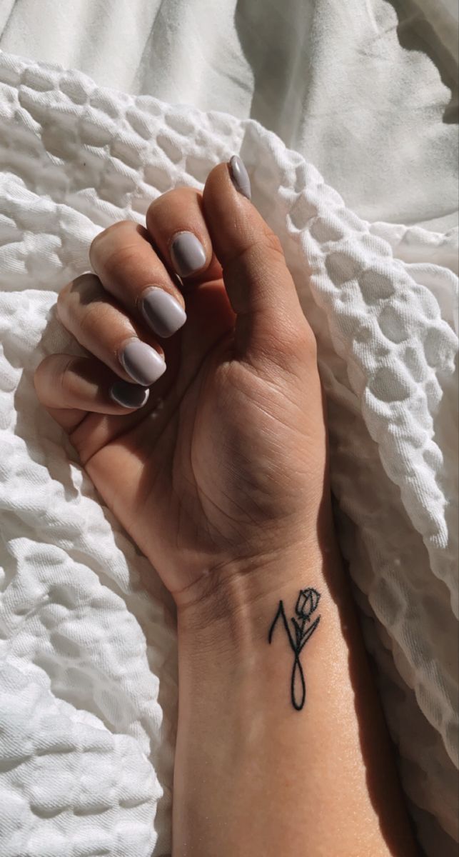 j tattoo with a rose intertwined. Meaningful tattoo. Simple and dainty font. Letter J Tattoo Ideas Heart, E&j Tattoo, Jashan Name Tattoo, Simple J Tattoos, Fancy J Tattoo, J In A Heart Tattoo, J And T Initial Tattoo, J Letter Tattoo Designs For Women, J On Finger Tattoo