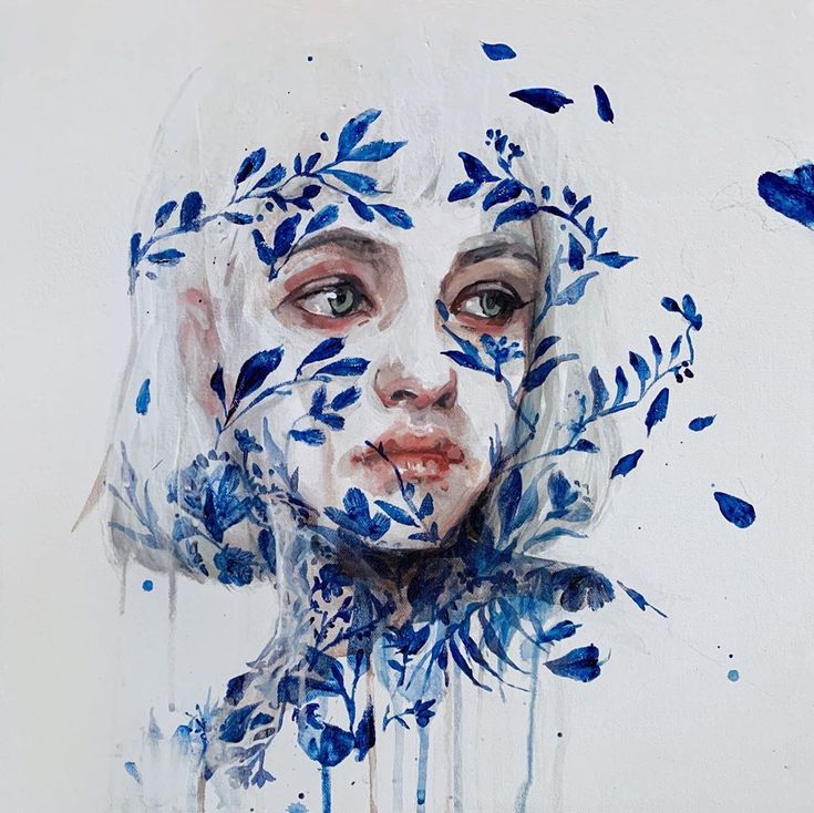 a painting of a woman with blue leaves on her face