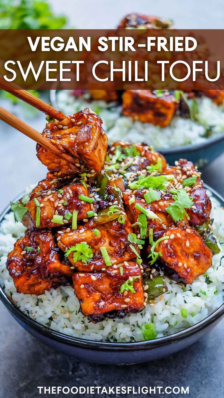 a bowl filled with meat and rice on top of a table