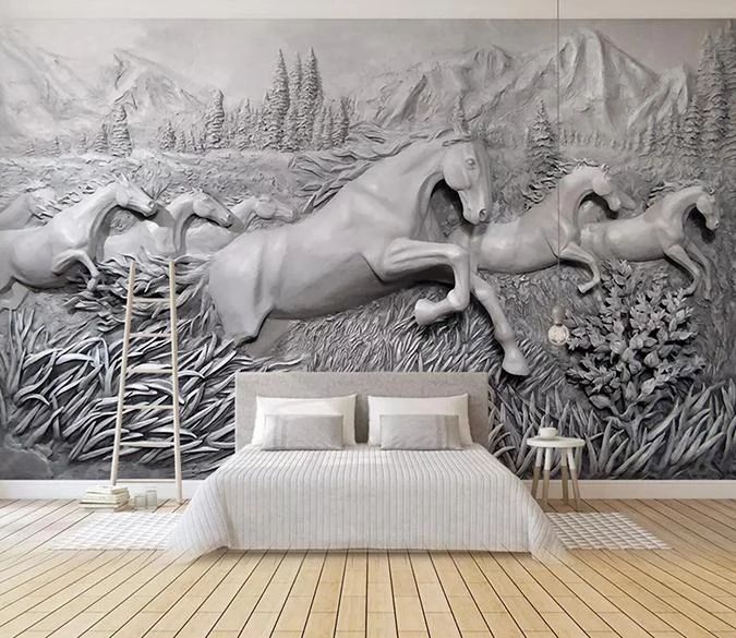 a bedroom with a large mural on the wall and two horses running in the grass