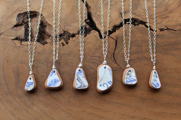 Ocean tumbled sea pottery, wire wrapped, on a sterling silver plated chain in your choice of length. Lobster clap closure. Pick your piece of pottery in the drop down, options shown in the third photo. You can find other sea pottery listings here... https://www.etsy.com/shop/WanderAndWonderCo *Customer satisfaction is my top priority. Each piece is handcrafted with attention to detail.  Please see shop policies and FAQ for more information about returns and exchanges. Sea Pottery Jewelry, Pottery Necklace, Pottery Jewelry, Jewelry Ocean, Jewelry Beach, Ocean Jewelry, Sea Pottery, Upcycled Jewelry, Sea Glass Jewelry