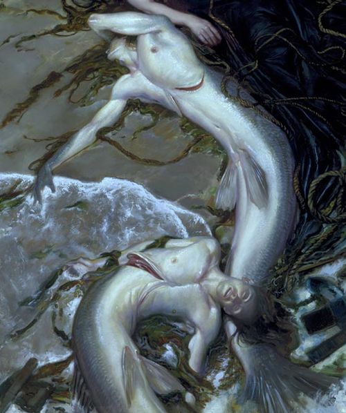 two mermaids in the water with their heads touching each other's backs,