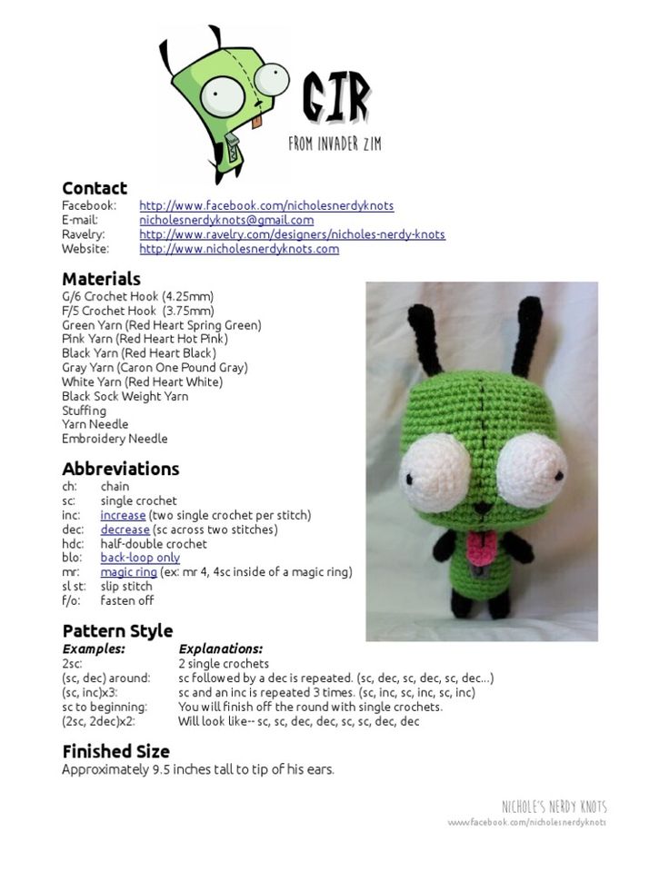 a green crocheted stuffed animal sitting on top of a white sheet with text