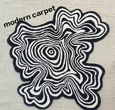 a black and white pattern with the words modern carpet on it