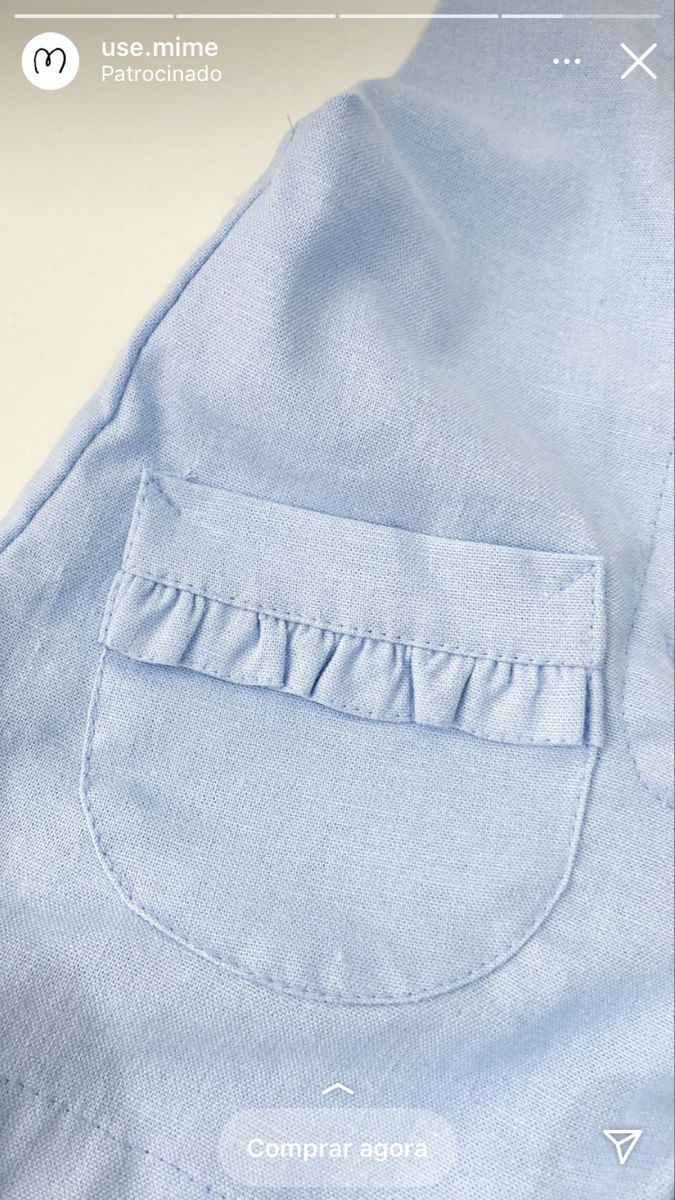 an image of the pocket on a blue shirt