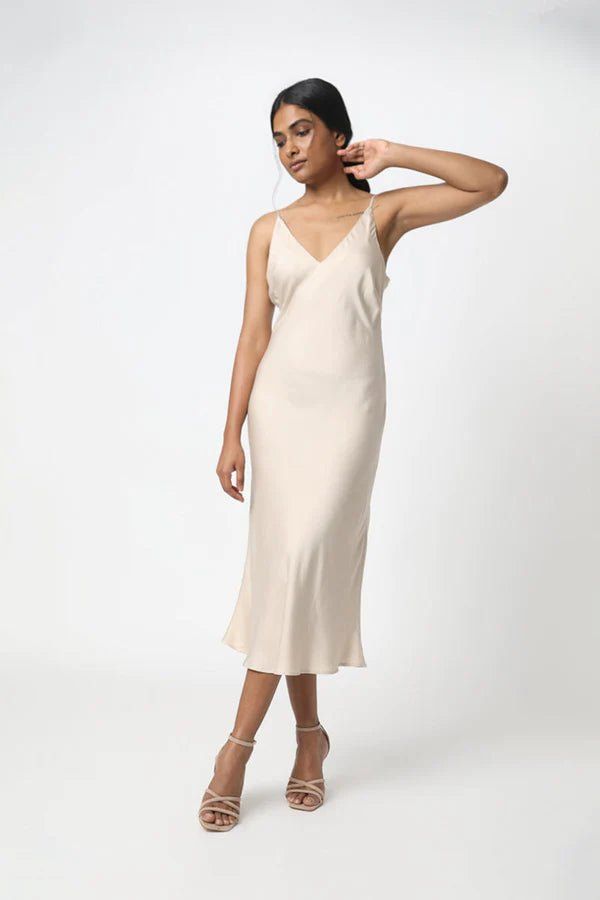 Cut on the bias for a figure-flattering drape that hugs your curves, this strappy slip dress is made in a luxuriously soft, lightweight and eco-friendly TENCEL™. Layer it over a turtleneck while it's still cold, then wear it with sandals and a jean jacket once the weather warms up. IMPACT & CARE Made with Tencel Modal Manufactured in family run factories in India that pay fair wages & provide medical care Non-toxic, AZO free dyes Machine wash cold or up to 86° F / 30° C Hang dry or tumble low he Boyfriend Shirt Dress, Elevated Basics, French Seam, Boyfriend Shirt, Sustainable Clothing, Luxury Fabrics, Capsule Wardrobe, Fabric Color, Jean Jacket