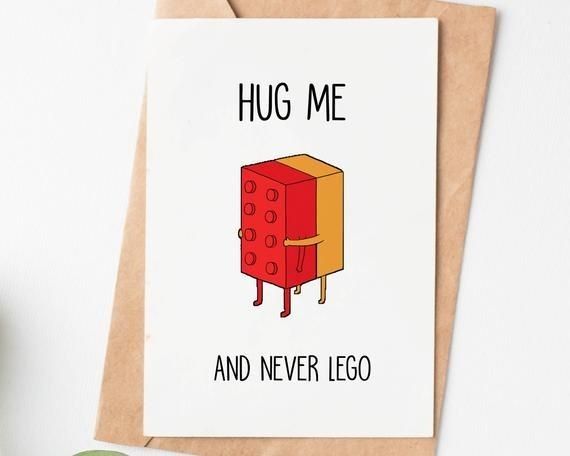 a card with an image of a lego on it and the words hug me and never lego