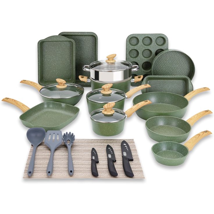 an assortment of green pots and pans with utensils