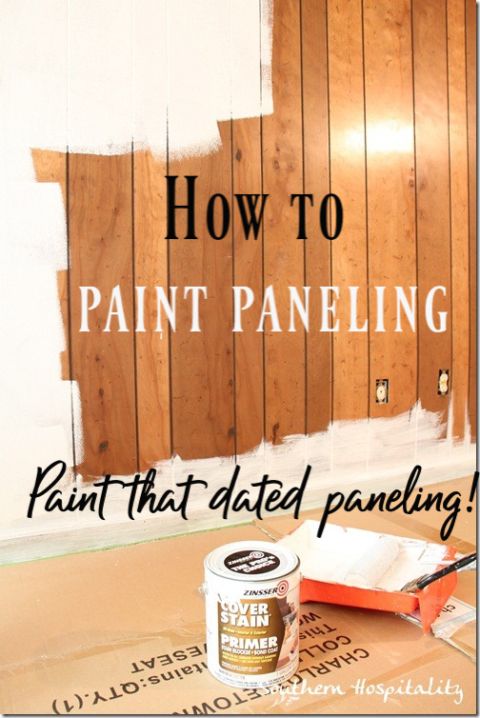 a can of paint sitting on top of a table next to a wall with the words how to paint paneling