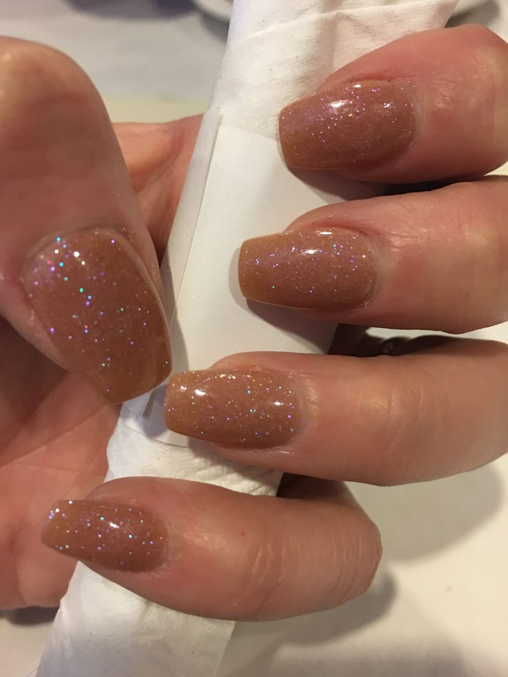 My new nails. ANC Brown Sparkle with coffin shape! Sparkle Beige Nails, Nails Brown With Glitter, Beige Nails Sparkle, Pearly Brown Nails, Glitter Beige Nails, Light Brown Nails With Glitter, Brown Glitter Nails Acrylic, Light Brown Glitter Nails, Brown Sparkle Nails Acrylic