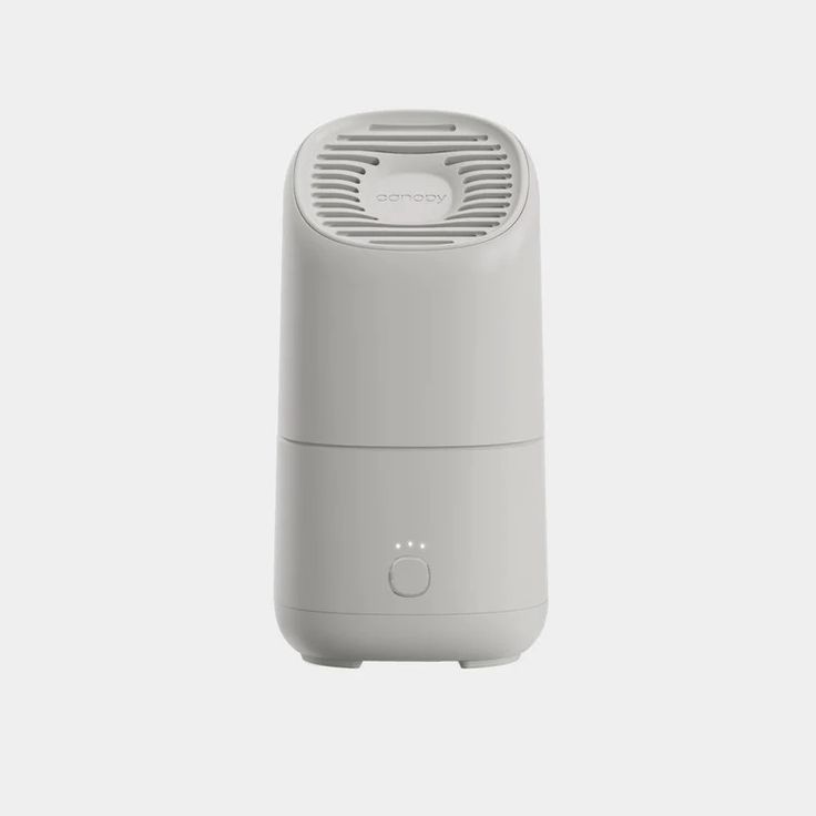 an air purigerator sitting on top of a white surface