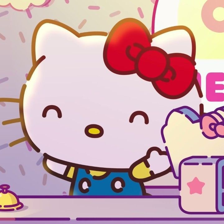 an animated hello kitty character is eating at a table