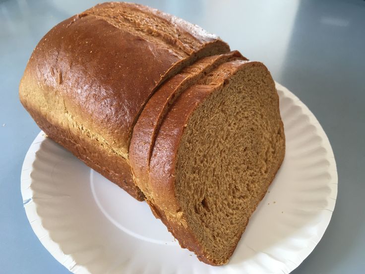 a loaf of bread sitting on top of a paper plate