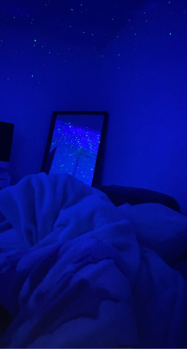 there is a blue light in the bedroom