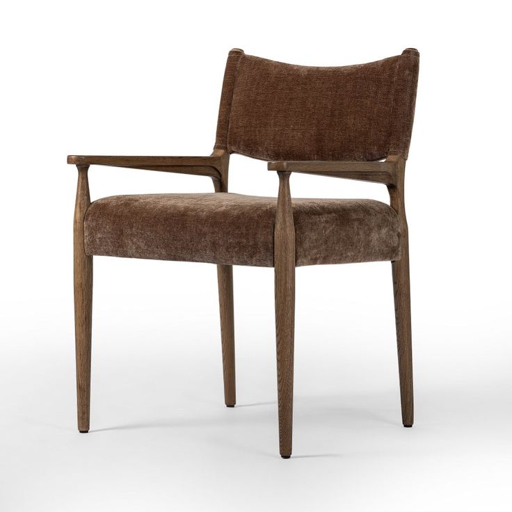 a wooden chair with a brown upholstered back and armrests on an isolated white background