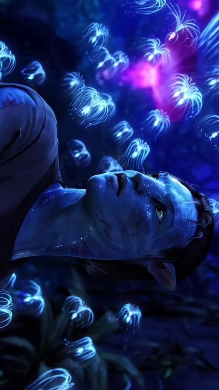 a man with his head in the air surrounded by bubbles and stars, as if he is looking at something