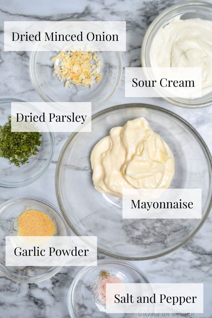 the ingredients to make homemade mayonnaise are shown in bowls on a marble countertop