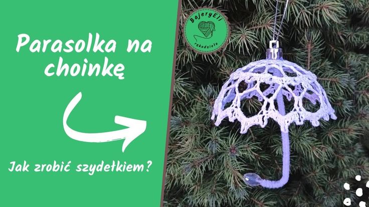 an umbrella ornament hanging from a tree with the words parasolka na chonke