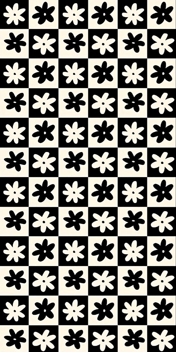 a black and white checkerboard pattern with small flowers on the bottom half of it