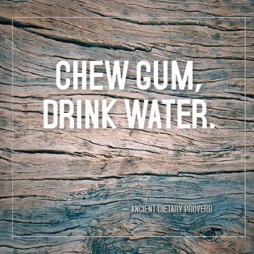 the words chew gum, drink water written on wooden planks with white lettering over it