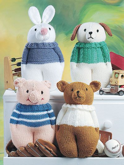 three knitted stuffed animals sitting next to each other on a white shelf in front of a painting