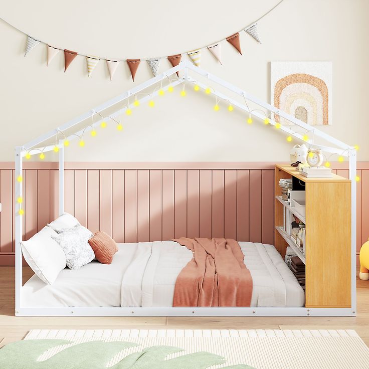 a white bed sitting in a bedroom next to a wooden dresser