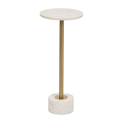 a white table with a gold base and a round marble pedestal on the top that has a metal bar in front of it