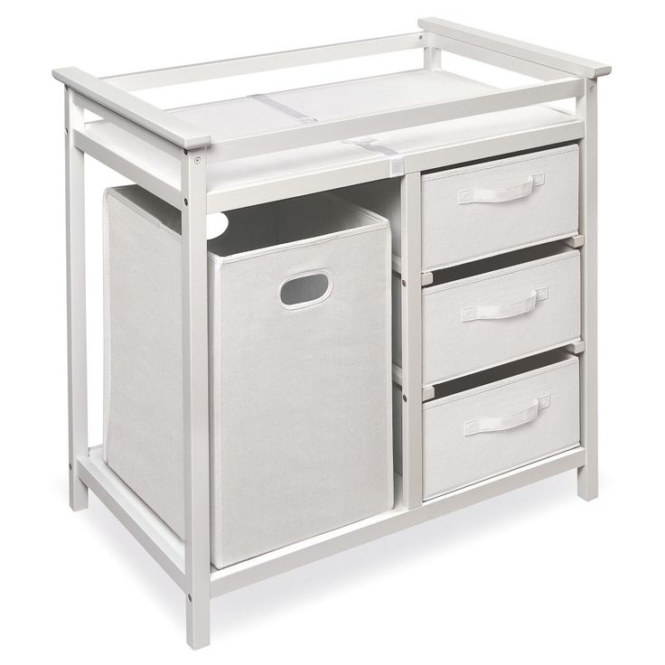 a white baby changing table with two drawers