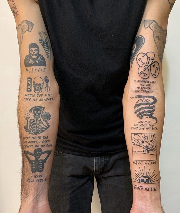 a man with many tattoos on his arms