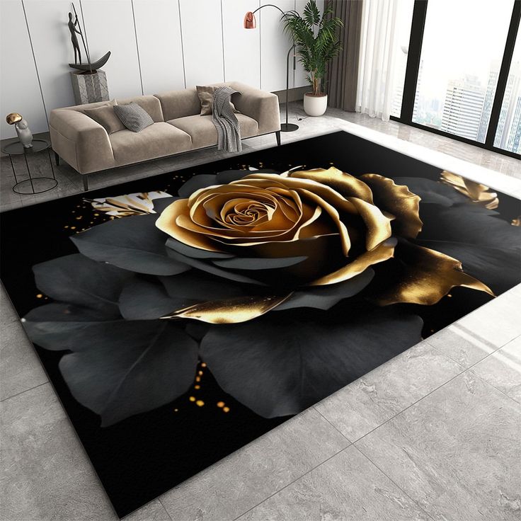 a black and gold rug with a large rose on the floor in front of a couch