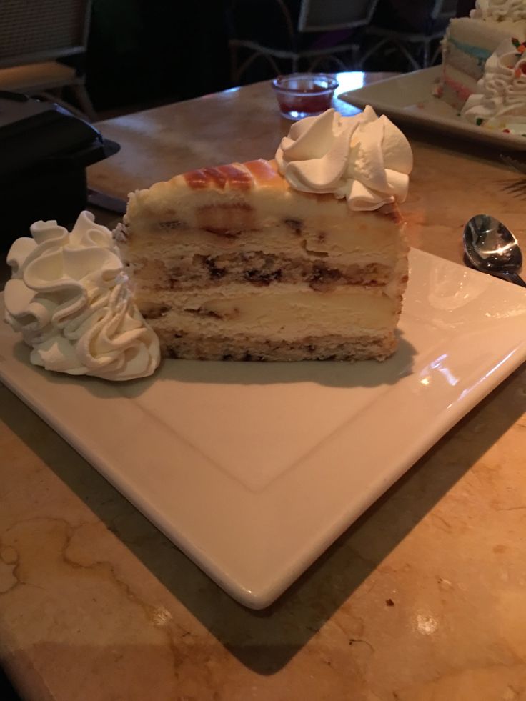 a piece of cake sitting on top of a white plate