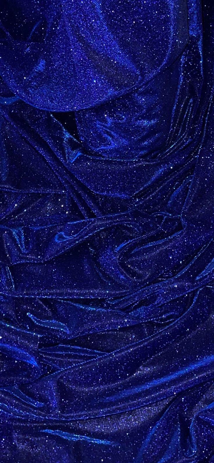 the blue fabric is very shiny and it looks like something out of space