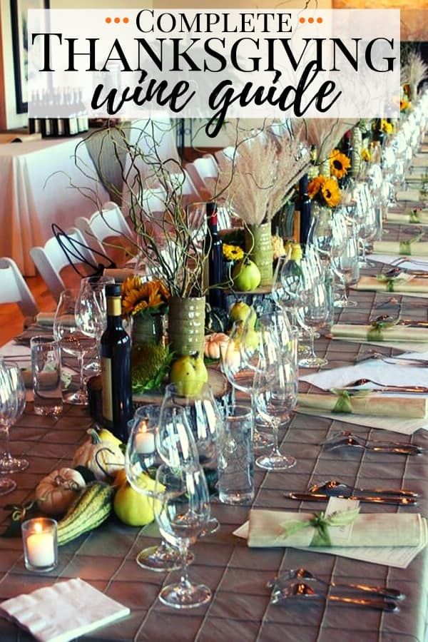 the complete thanksgiving wine guide is displayed on a long table with glasses and bottles full of wine