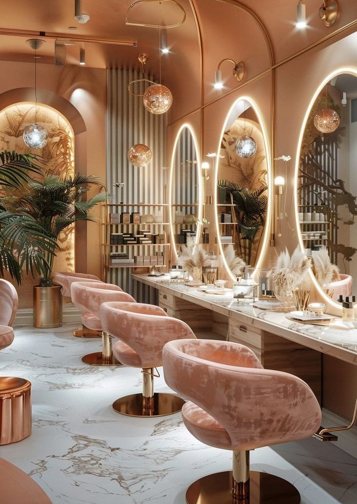 the interior of a beauty salon with pink chairs and round mirrors on the wall above them