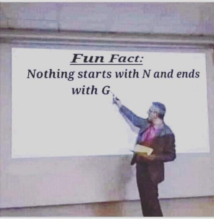 a man standing in front of a projection screen giving a presentation about fun fact nothing starts with n and ends with g