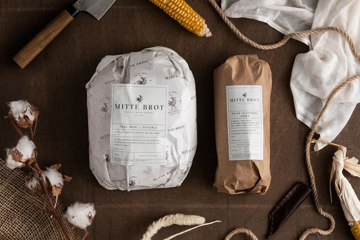 the ingredients to make white frosted corn on the cob are laid out next to each other