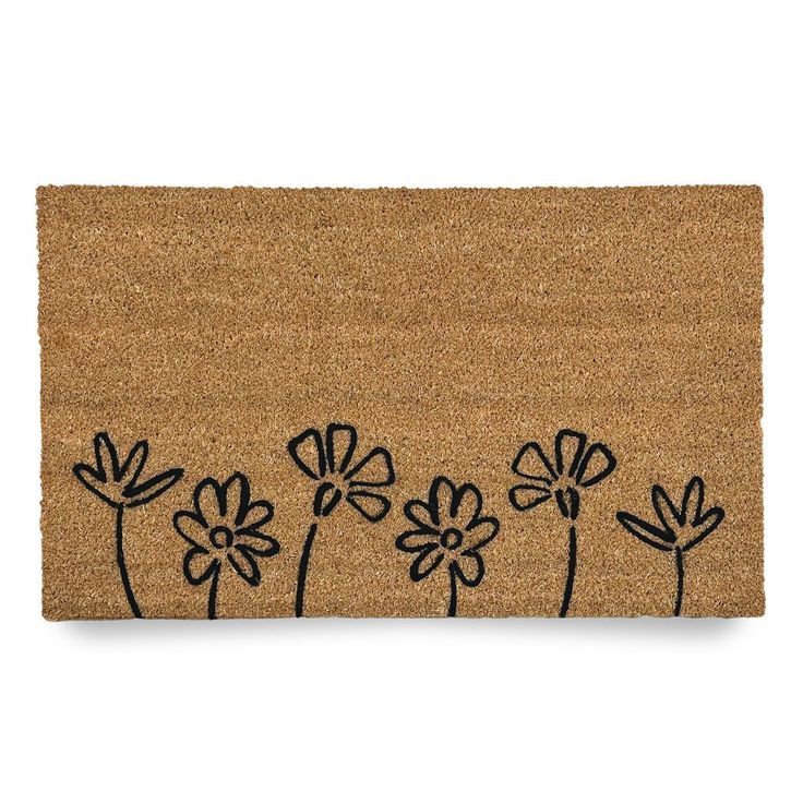 a door mat with flowers drawn on it