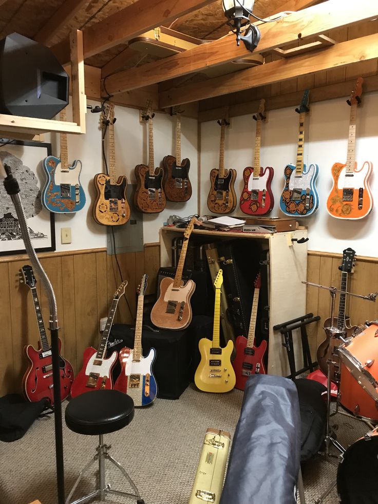 a room filled with guitars and musical equipment