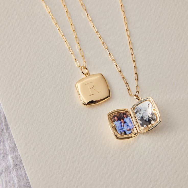 Our new, timeless square locket necklace is an elegant way for you to carry your loved ones close to your heart. Hold pictures of your loved ones or a memento that is special to you. Engrave an initial on the front and up to 3 names or a phrase on the back. available in 10k and 14k yellow gold lockets are engraved using diamond drag technology opens with space inside for 2 pictures, which fit easily inside the locket. See our guide for adding photos to your locket hangs on adjustable length pape Gold Lockets, Unique Locket, Picture Locket, Sterling Silver Locket, Photo Locket Necklace, Vintage Lockets, Nameplate Necklace, Gold Locket, Photo Locket