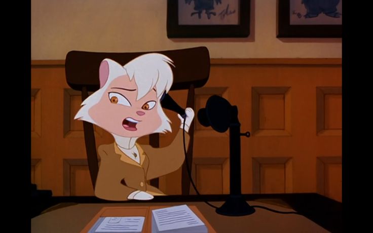 an animated character sitting at a desk in front of a microphone and papers on the table