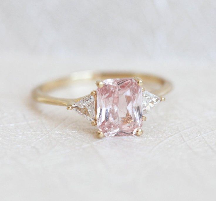 Trillion Diamond Ring, Geometric Engagement Ring, Engagement Ring Radiant, Peach Sapphire Rings, Pink Diamonds Engagement, Pink Engagement, Pink Wedding Rings, Pink Diamond Engagement Ring, Trillion Diamonds