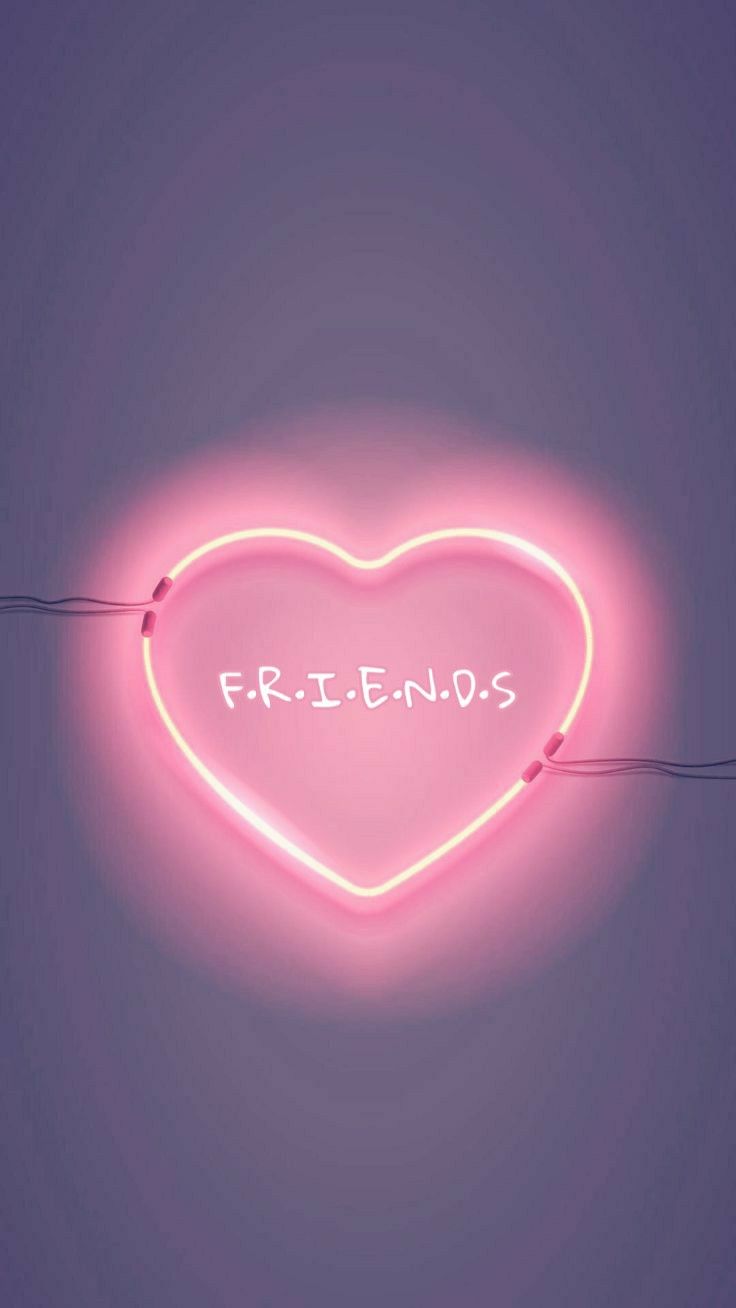 a neon heart with the word friends written on it in front of a purple background