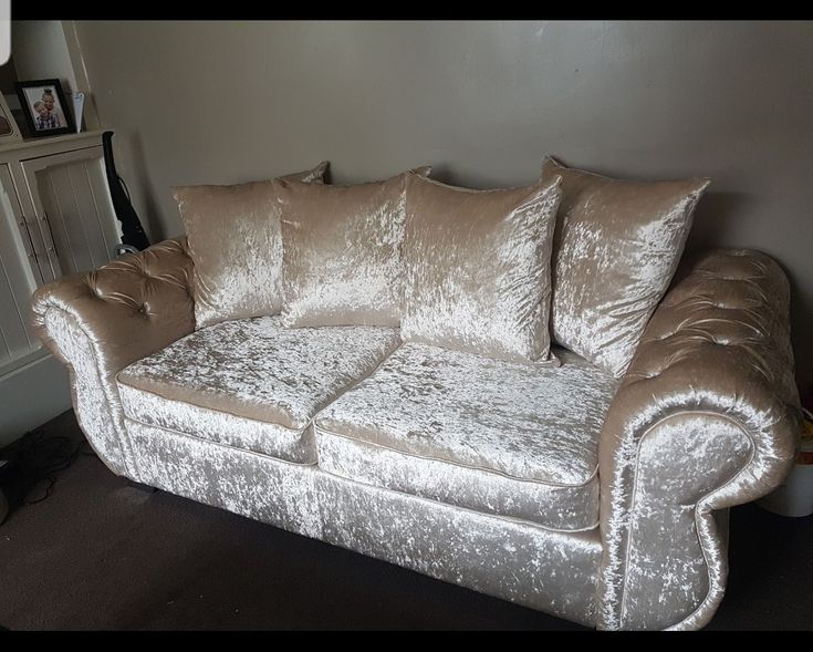 a couch that has some pillows on it