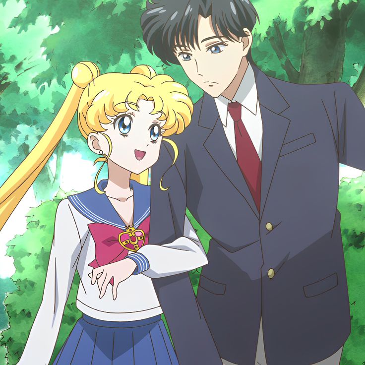 two anime characters standing next to each other in front of some trees and bushes with their arms around one another