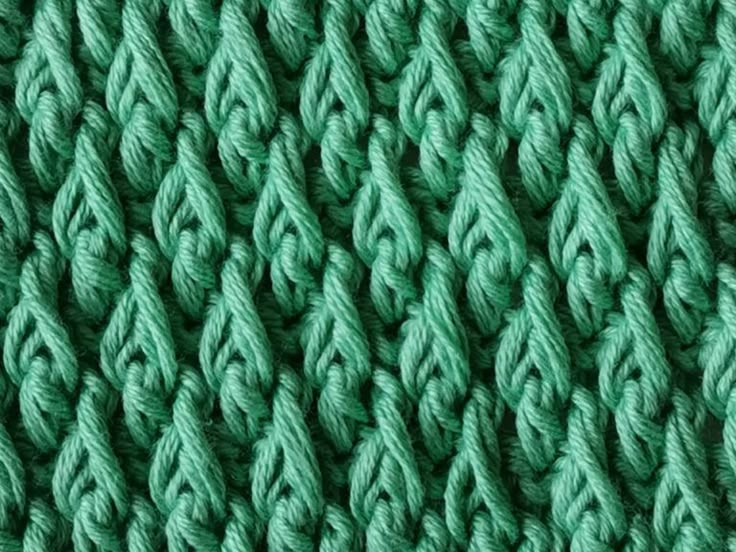 close up view of green knitted fabric