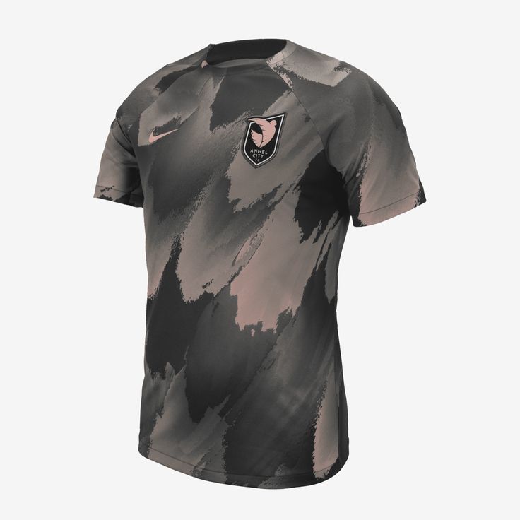 the nike soccer jersey is designed to look like it has been painted with black and pink paint