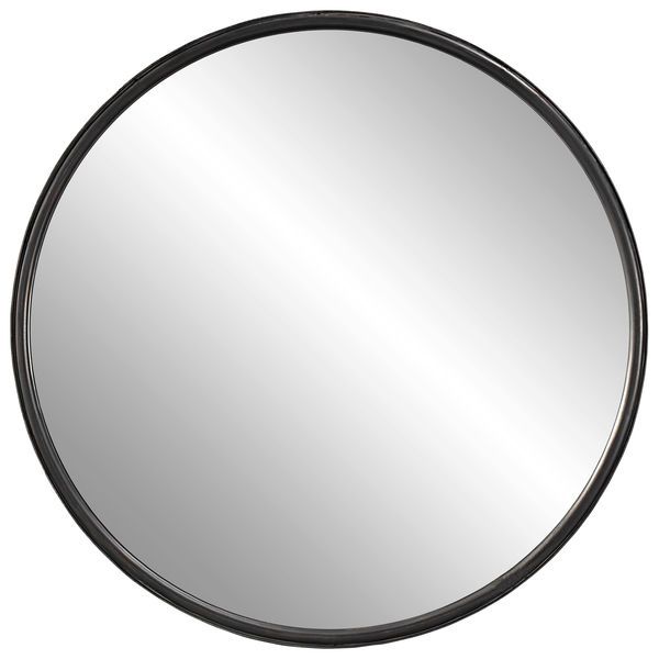 a round mirror on a white background