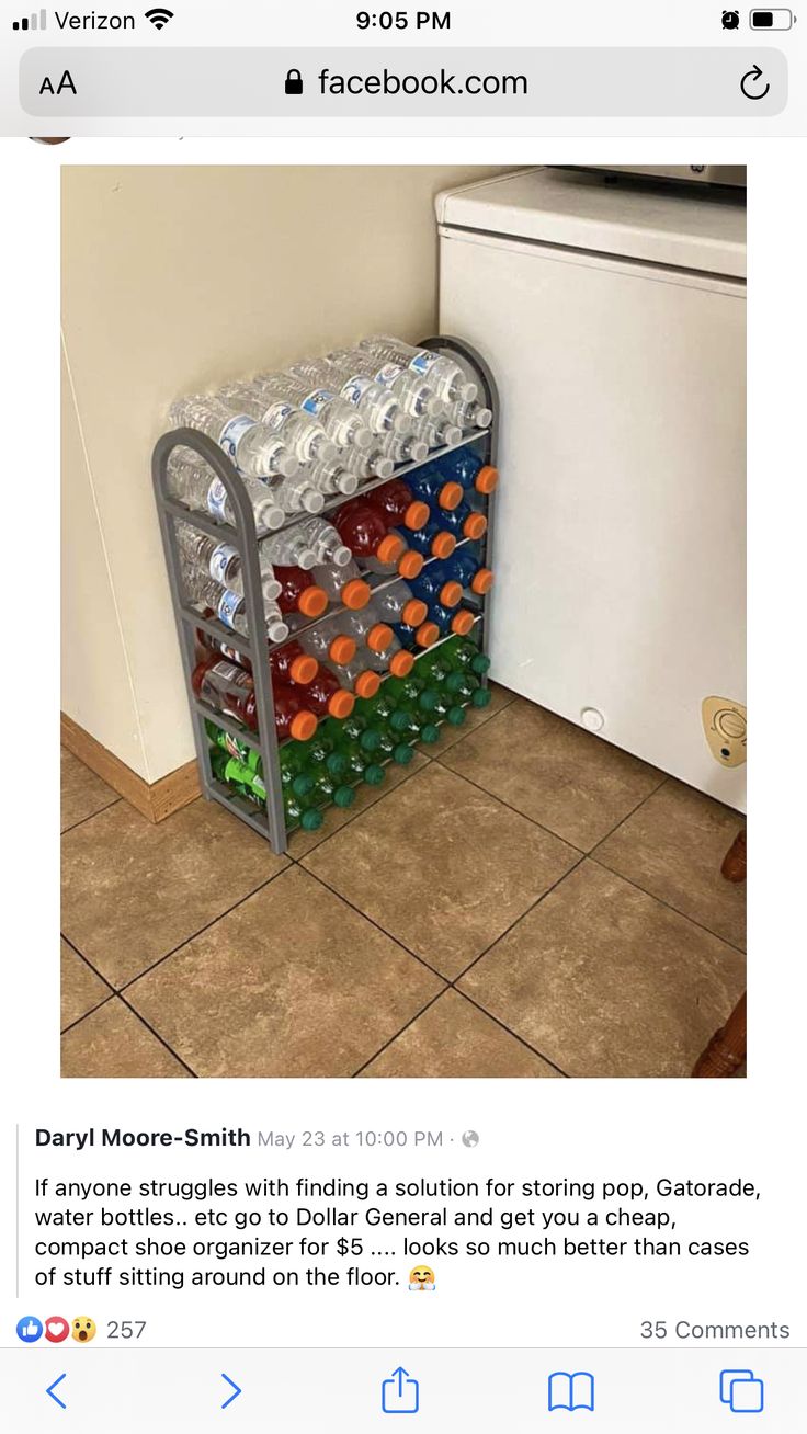 a stack of plastic bottles sitting on top of a metal rack