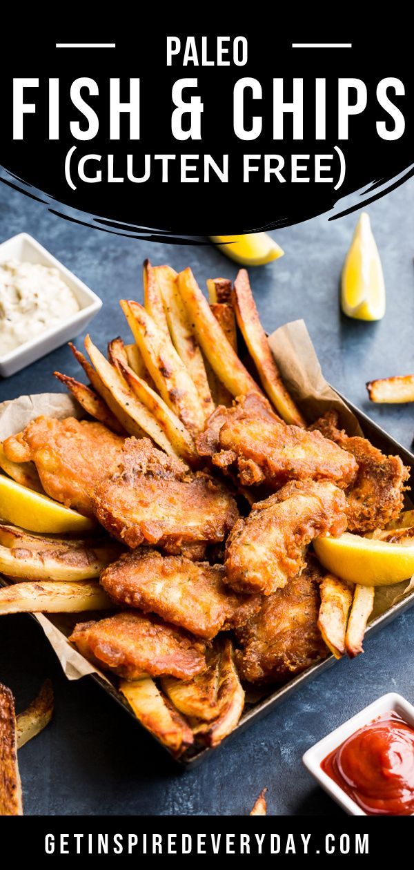 fried fish and chips with ketchup, lemon wedges and mayonnaise