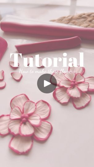 the video shows how to make paper flowers